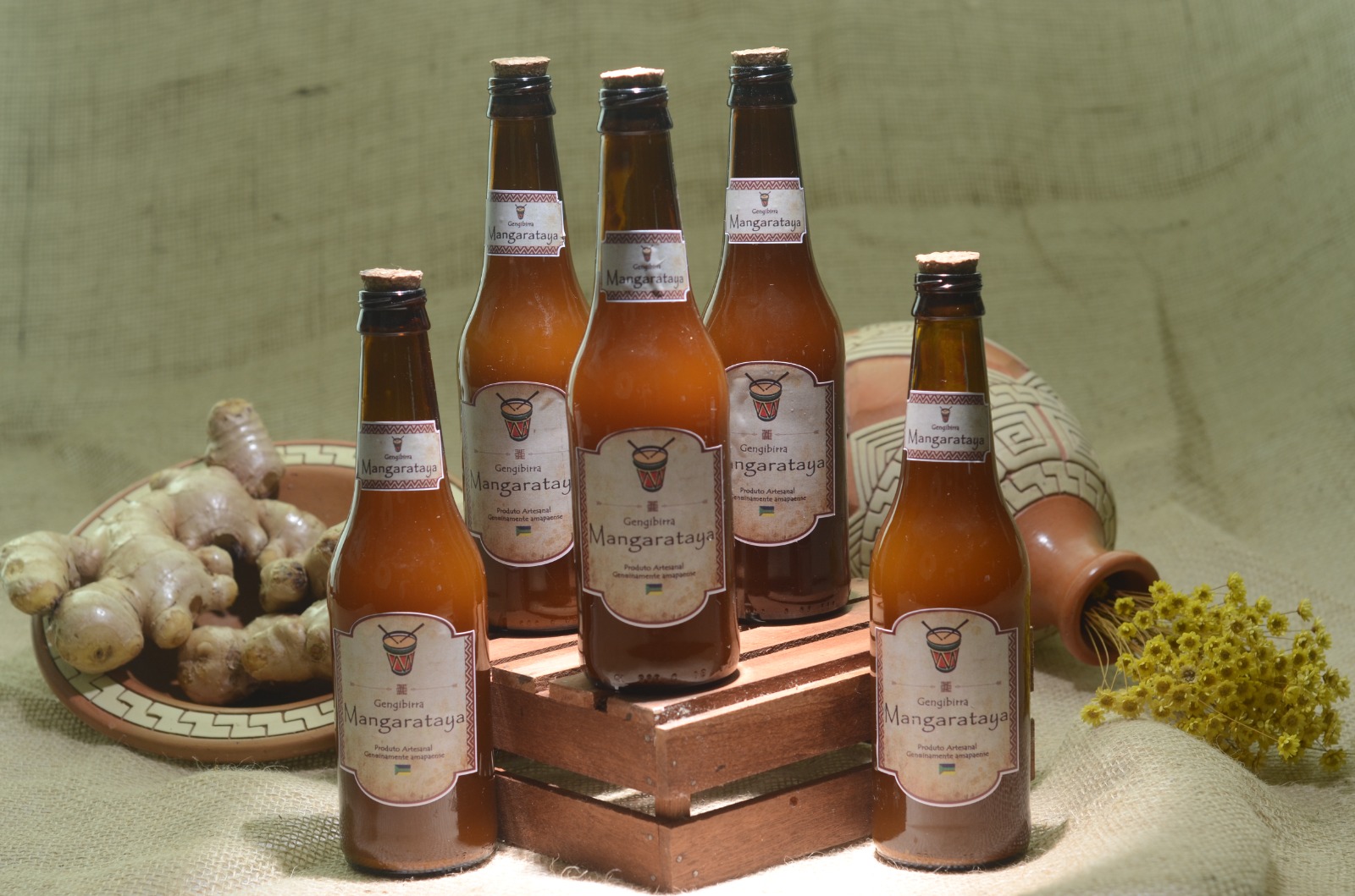 Gengibirra bottles with fresh ginger